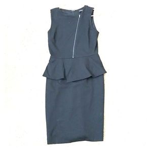 Banana Republic black peplum sheath dress. Tags on